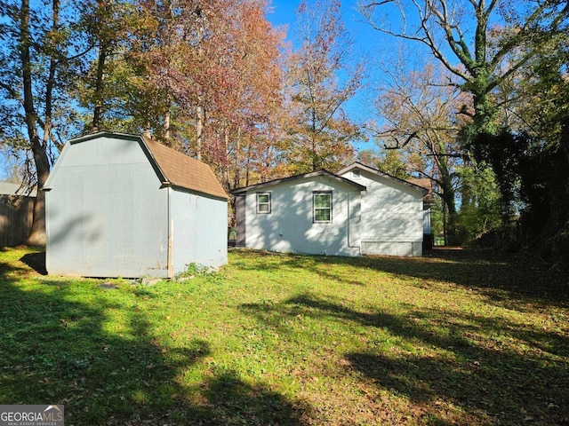 view of outdoor structure with a yard