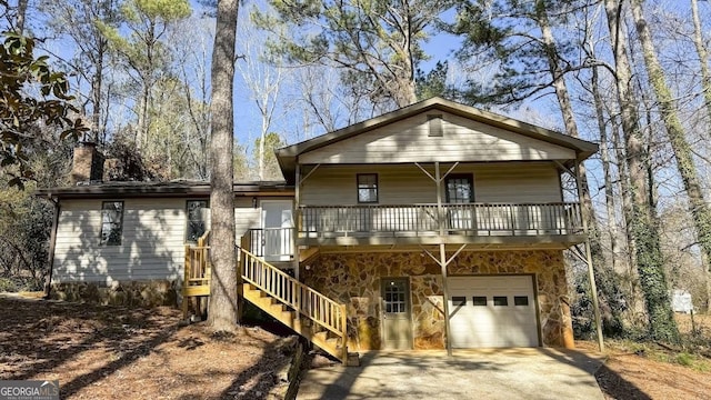 view of front of house with a garage and covered porch