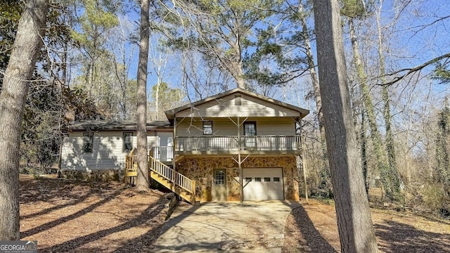 view of front of home with a garage and a porch