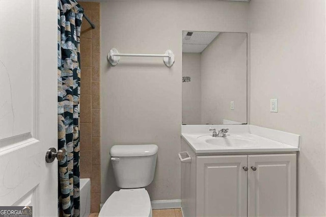 full bathroom featuring vanity, shower / bath combo, and toilet