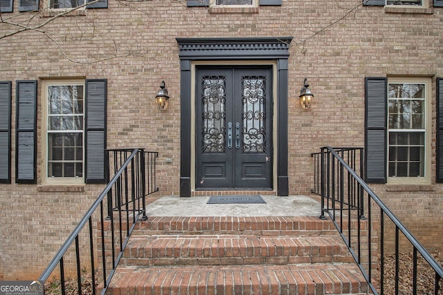 doorway to property featuring french doors