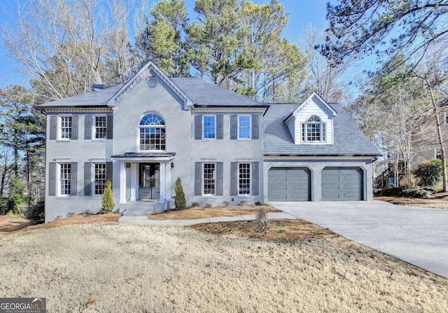 colonial-style house with a garage