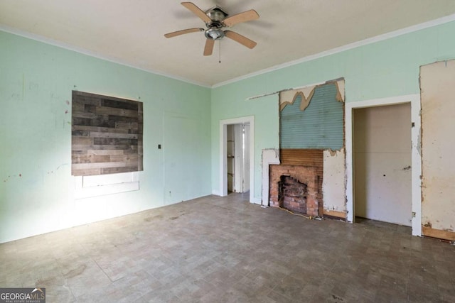 unfurnished living room featuring ceiling fan and ornamental molding