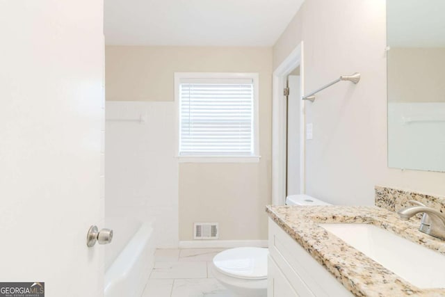 full bathroom featuring vanity, tub / shower combination, and toilet