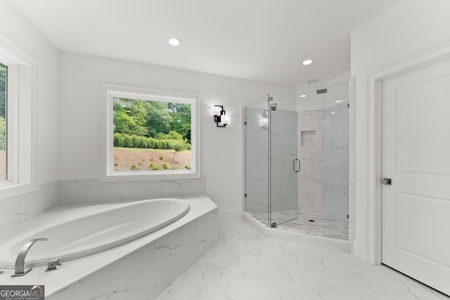 bathroom with independent shower and bath