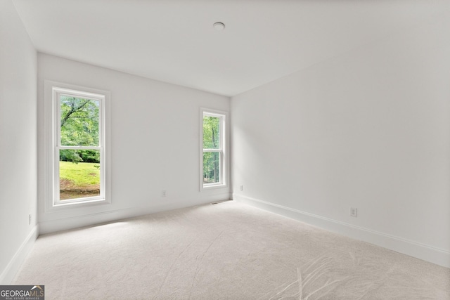 empty room with light carpet