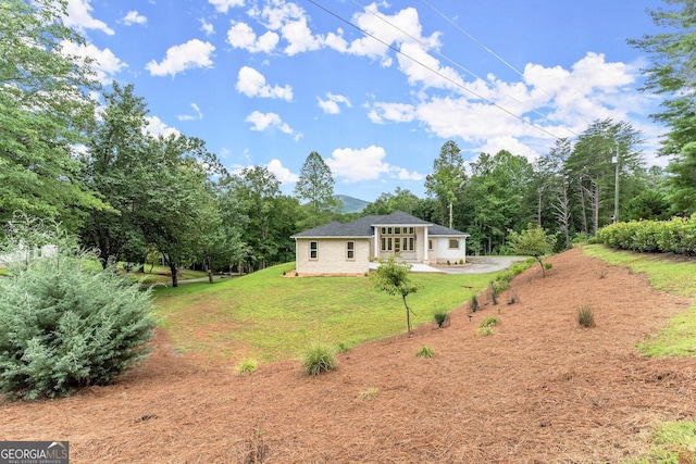 exterior space with a yard