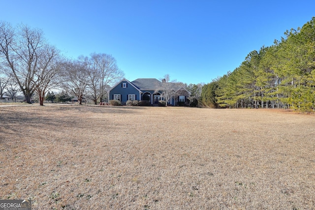 front facade with a front lawn