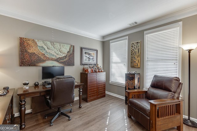 office space featuring hardwood / wood-style flooring and ornamental molding