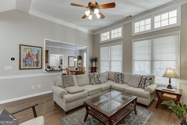 living room with crown molding, lofted ceiling, ceiling fan, and dark hardwood / wood-style flooring