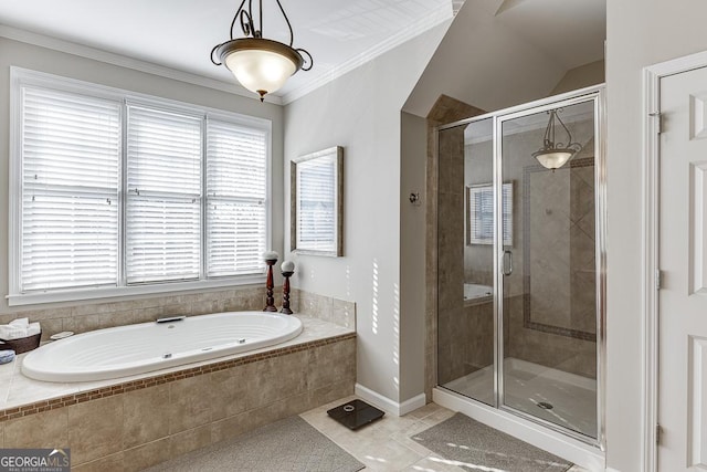 bathroom featuring tile patterned flooring, ornamental molding, and shower with separate bathtub