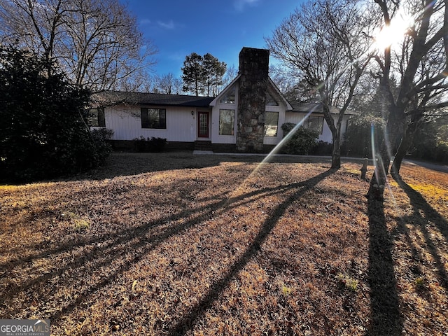 view of front of property featuring a chimney