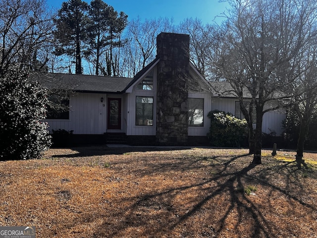 view of front of property featuring a chimney