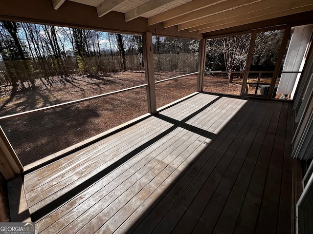 wooden terrace featuring a fenced backyard