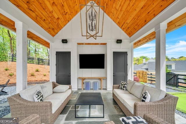 view of patio / terrace featuring an outdoor living space with a fireplace