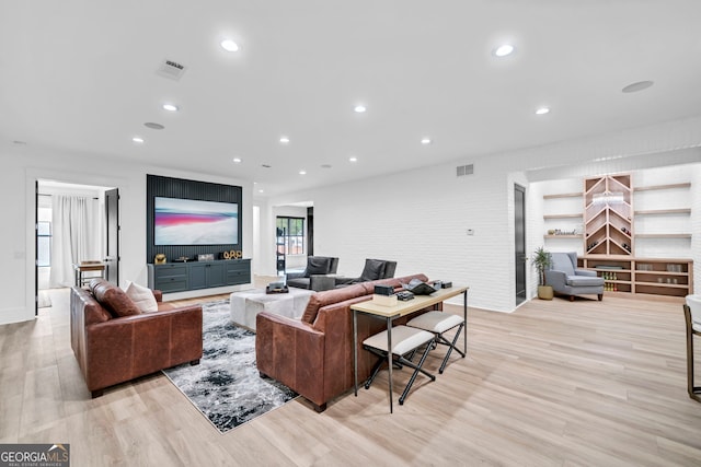 living room with light hardwood / wood-style floors