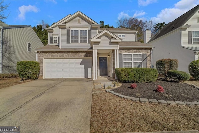 front facade with a garage