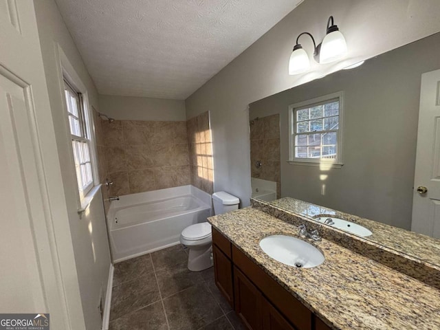 spare room featuring dark hardwood / wood-style flooring and a textured ceiling