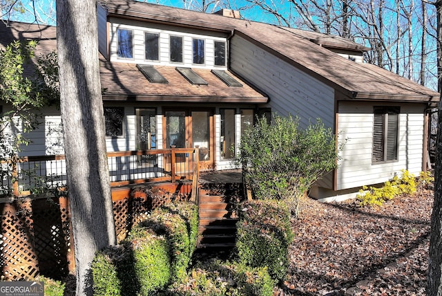 view of front facade featuring a wooden deck