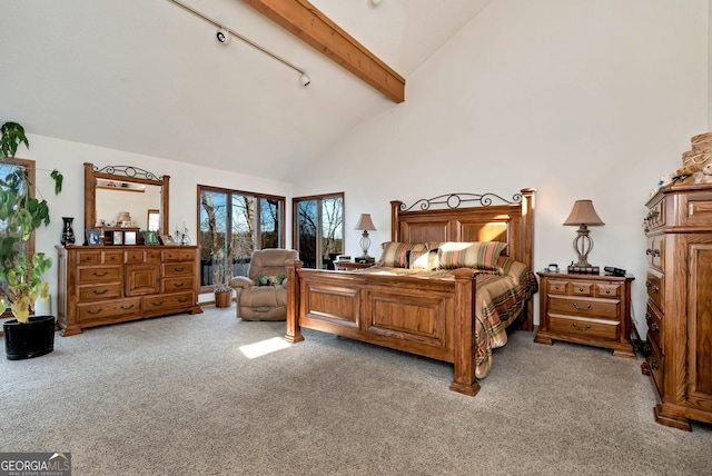 bedroom with rail lighting, high vaulted ceiling, light carpet, access to outside, and beamed ceiling