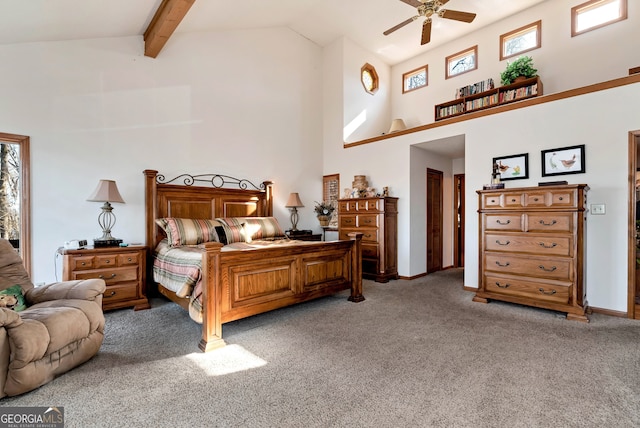 bedroom featuring beamed ceiling, ceiling fan, light carpet, and high vaulted ceiling