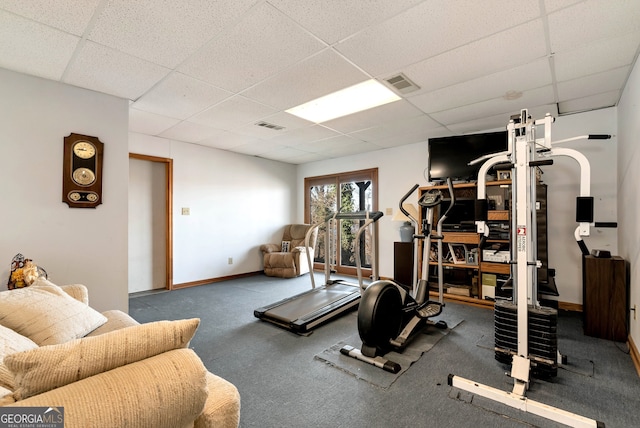 exercise area featuring a drop ceiling