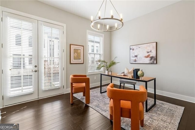 office area featuring dark hardwood / wood-style floors, a notable chandelier, and french doors