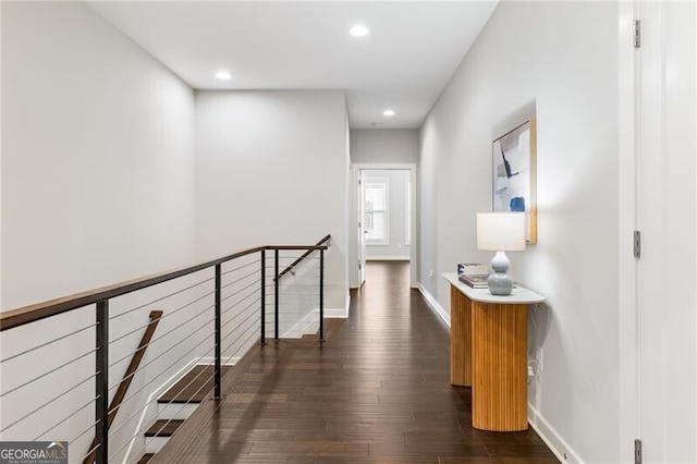 hallway featuring dark hardwood / wood-style floors