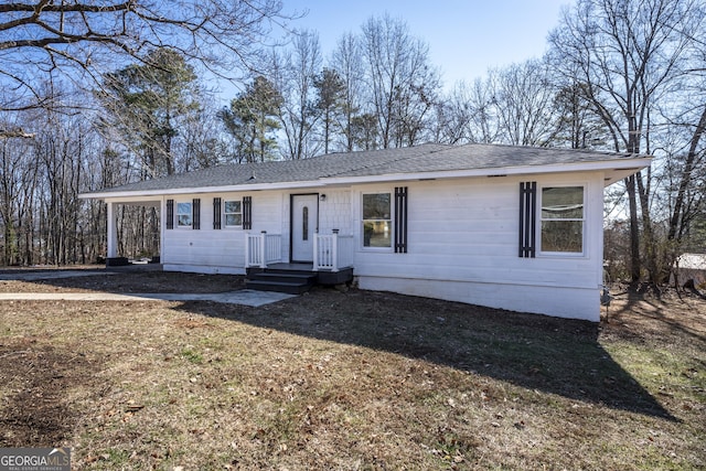 ranch-style home with a front yard