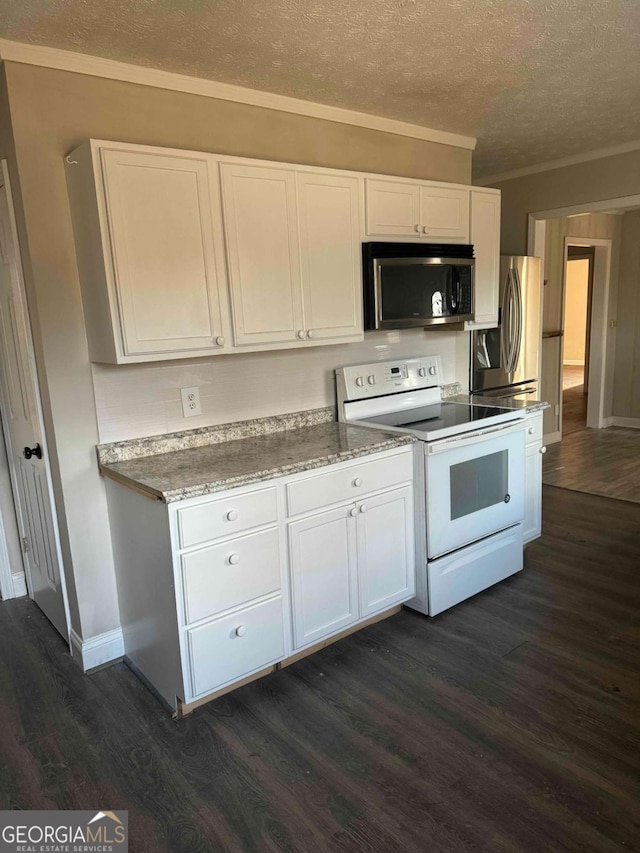 kitchen featuring electric stove, white cabinetry, and dark hardwood / wood-style floors