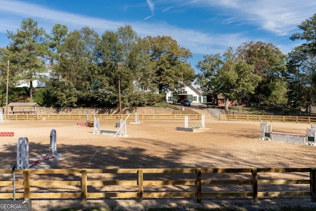 view of home's community featuring an enclosed area