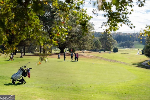 surrounding community with a lawn