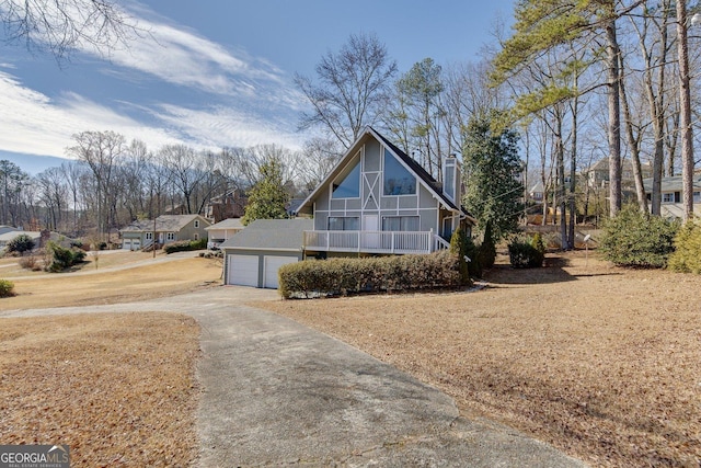 view of property exterior featuring a garage