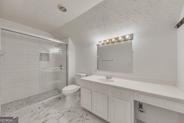 bathroom featuring vanity, walk in shower, a textured ceiling, and toilet