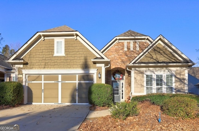 craftsman-style house featuring a garage