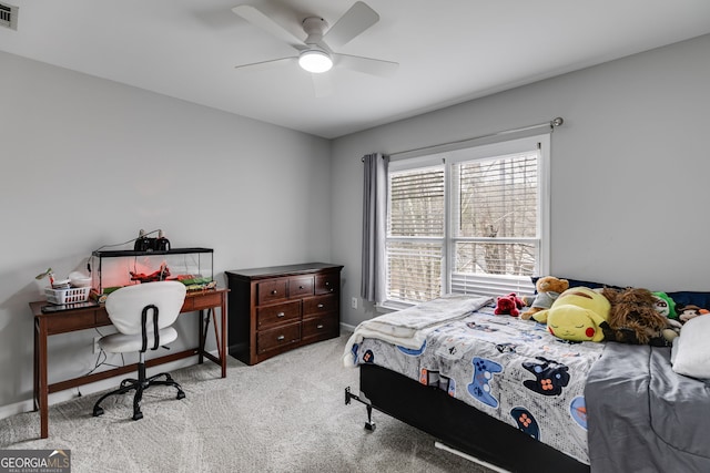 carpeted bedroom with ceiling fan