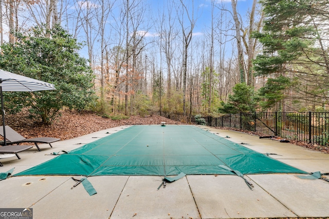 view of pool featuring a patio area