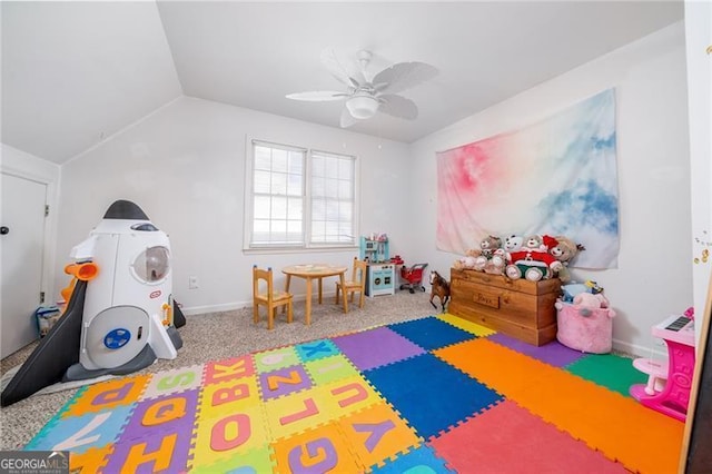 game room featuring ceiling fan, lofted ceiling, and carpet