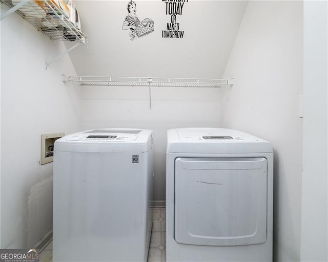 laundry area featuring washing machine and dryer