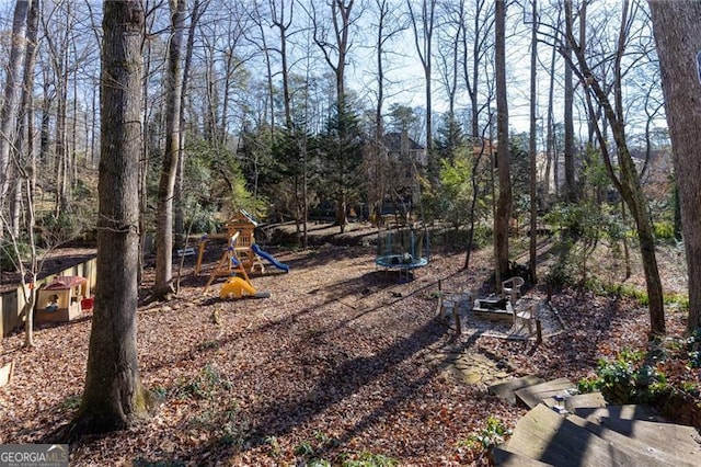 view of yard with a playground