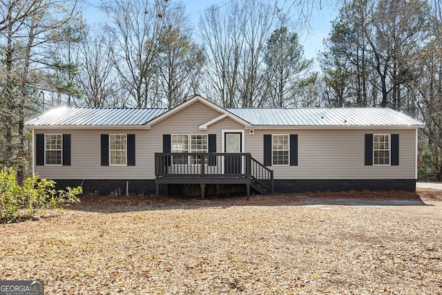 view of front facade featuring a deck