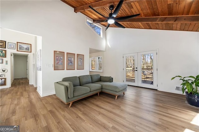 living room with french doors, ceiling fan, wood ceiling, and light hardwood / wood-style floors