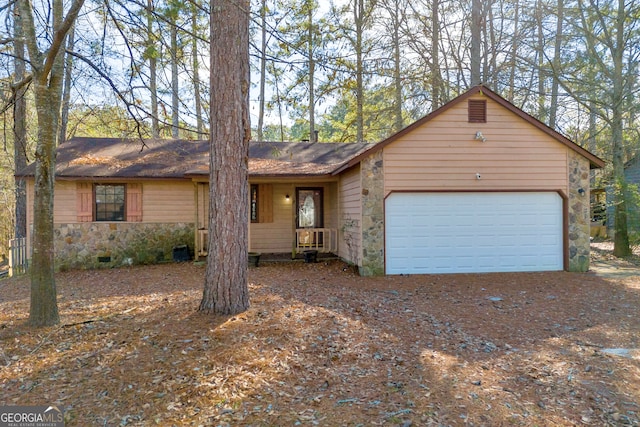 ranch-style home with a garage