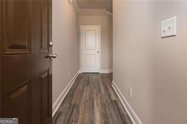 hallway featuring dark wood-type flooring