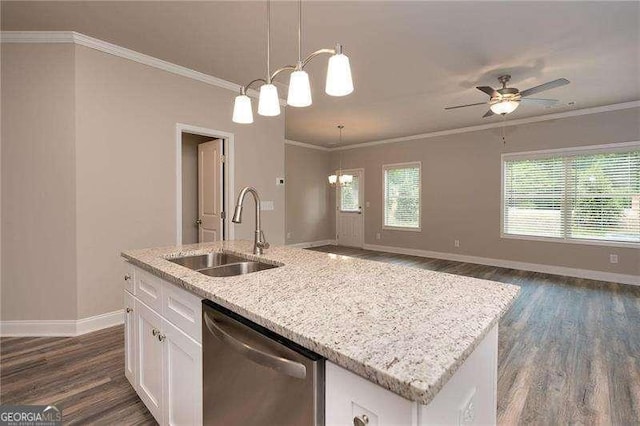 kitchen with pendant lighting, white cabinetry, an island with sink, sink, and stainless steel dishwasher