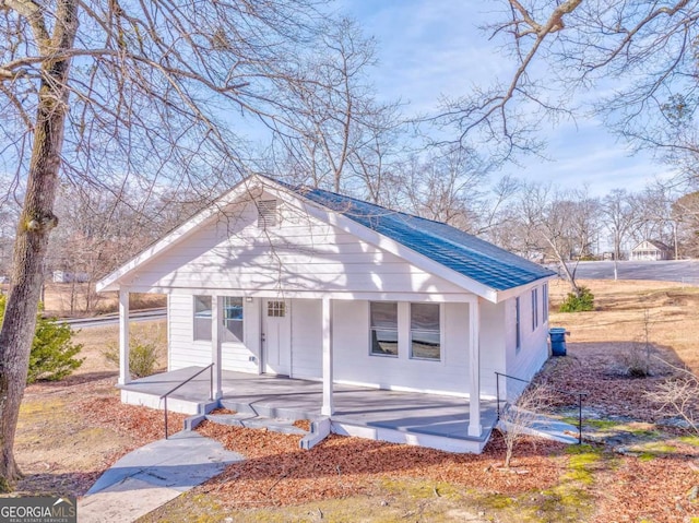 bungalow-style house featuring covered porch