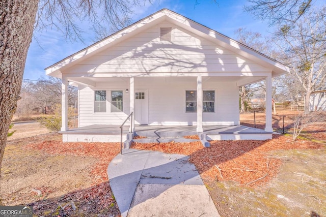 bungalow-style home featuring covered porch