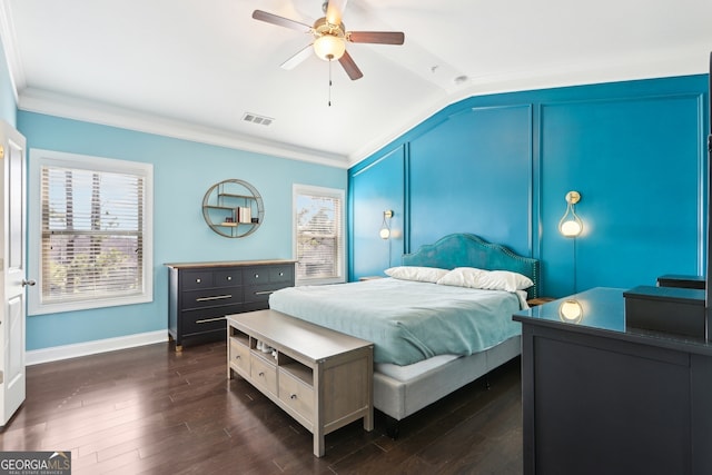 bedroom with ceiling fan, lofted ceiling, ornamental molding, and dark hardwood / wood-style flooring