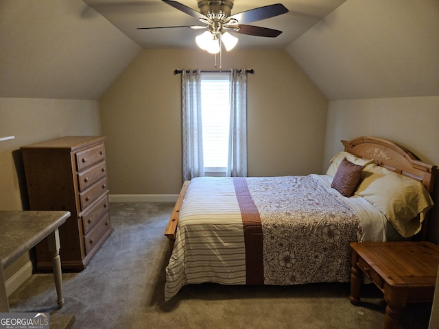 bedroom with vaulted ceiling, baseboards, dark colored carpet, and a ceiling fan