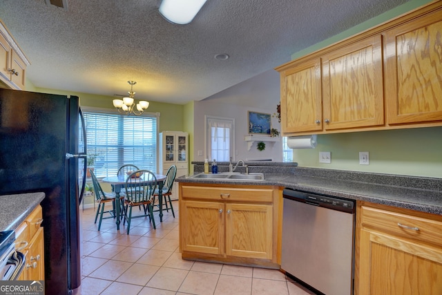 kitchen featuring sink, dishwasher, an inviting chandelier, hanging light fixtures, and light tile patterned flooring